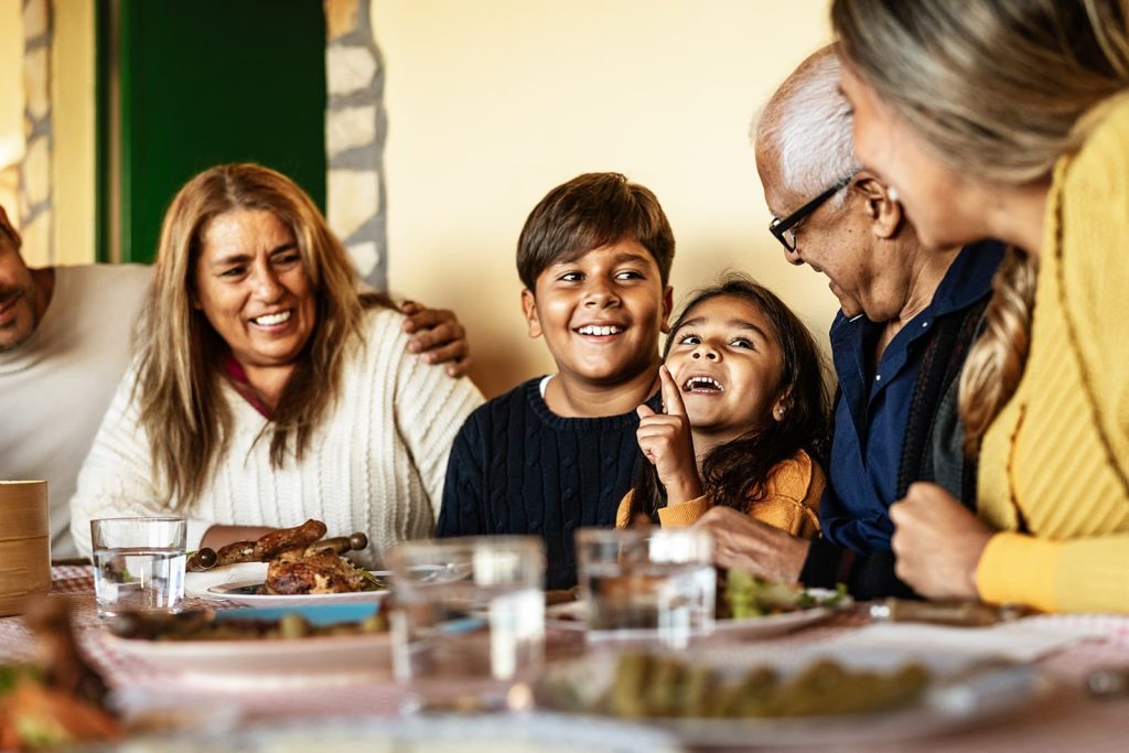 A happy multigenerational family sharing a meal