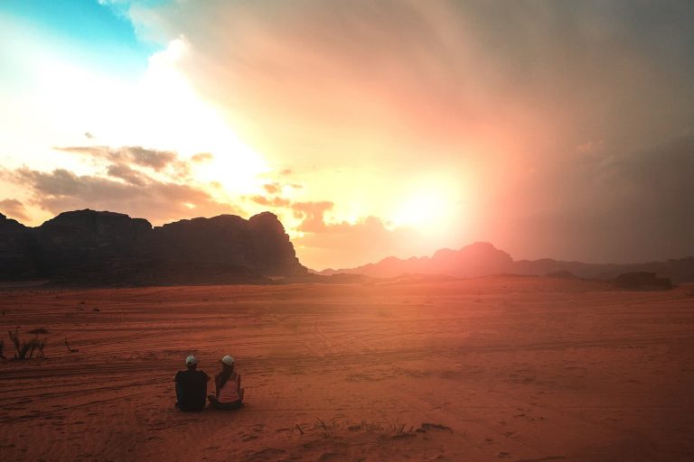 Pour-over Will Creation - Nevada. Photo of a couple watch the sunset together in the Nevada desert